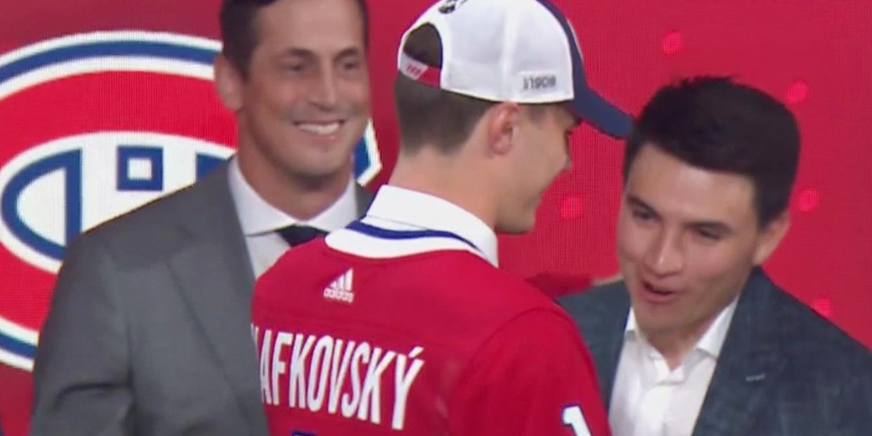 juraj slafkovsky nick suzuki